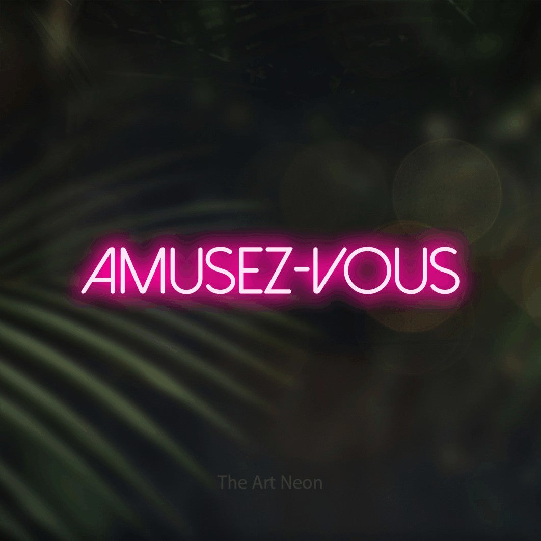 LED neon sign reading “AMUSEZ-VOUS”, arranged in a single line.