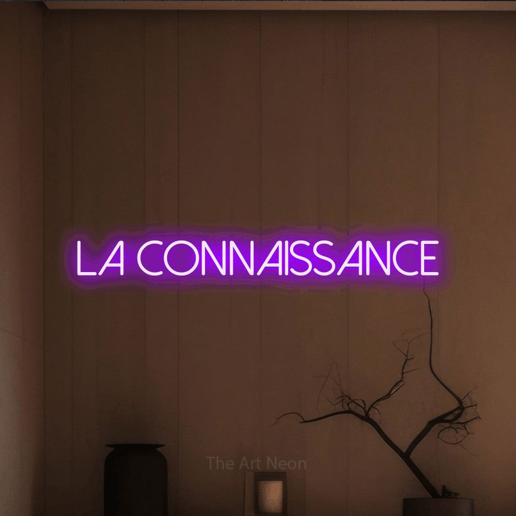 LED neon sign reading “LA CONNAISSANCE”, arranged in a single line.