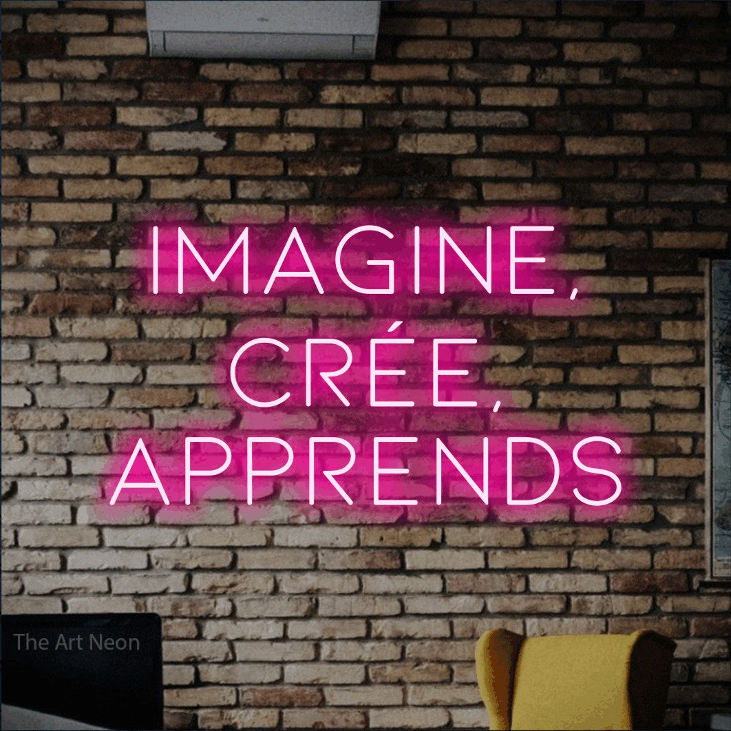 LED neon sign reading “Imagine, Crée, Apprends”, arranged in 3 lines.