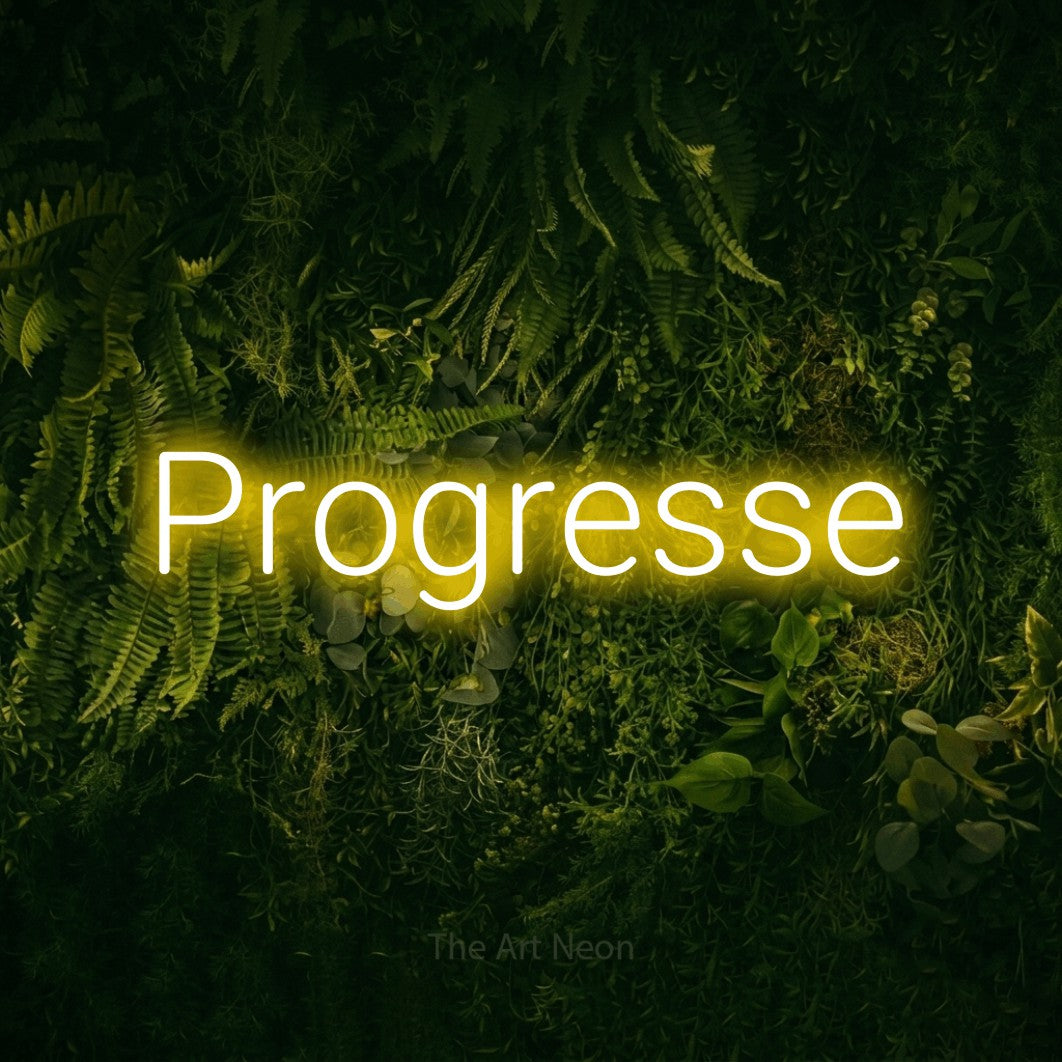 LED neon sign reading “Progresse”, arranged in a single line.
