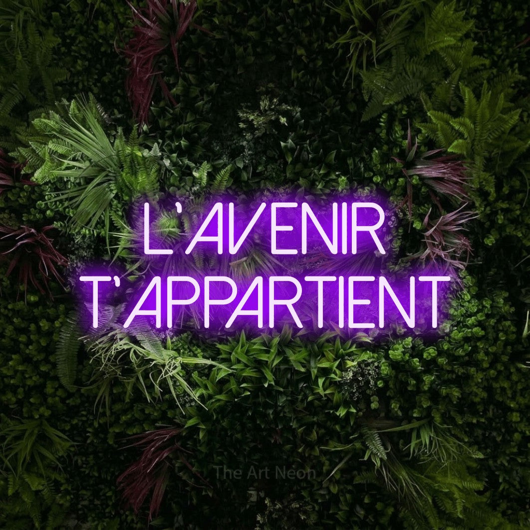LED neon sign reading “l'avenir t'appartient”, arranged in 2 lines.