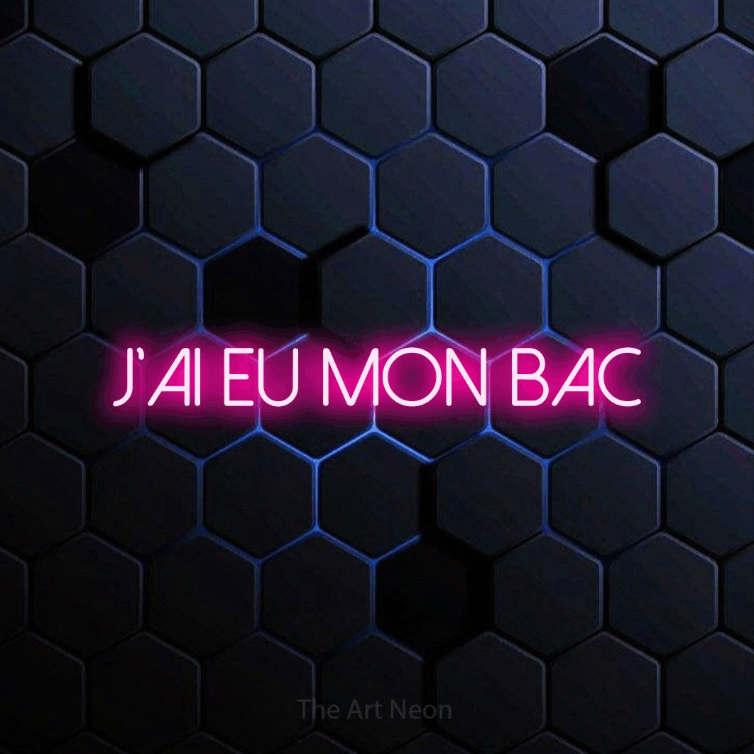 LED neon sign reading “J'AI EU MON BAC”, arranged in a single line.