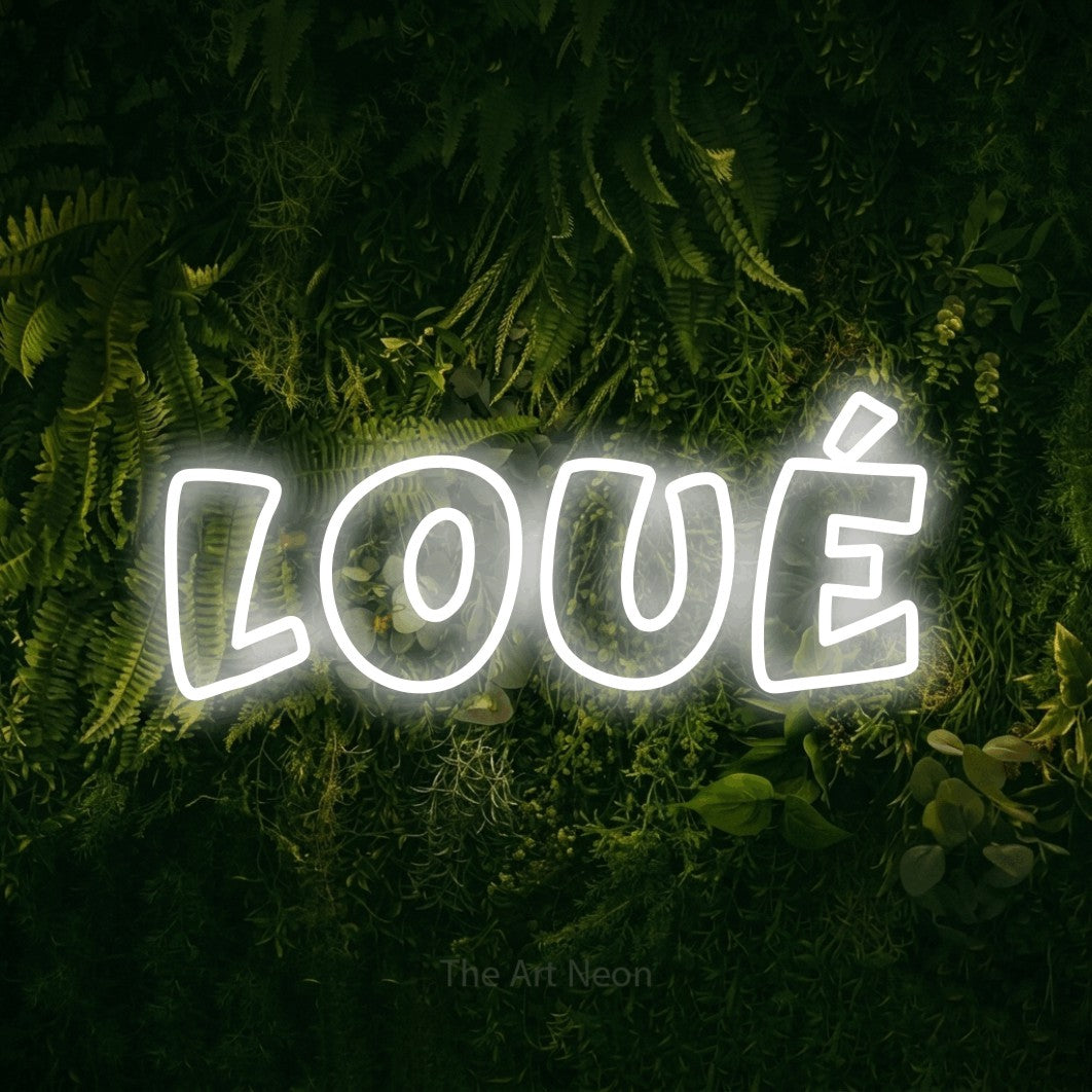 LED neon sign reading “Loué”, arranged in a single line.