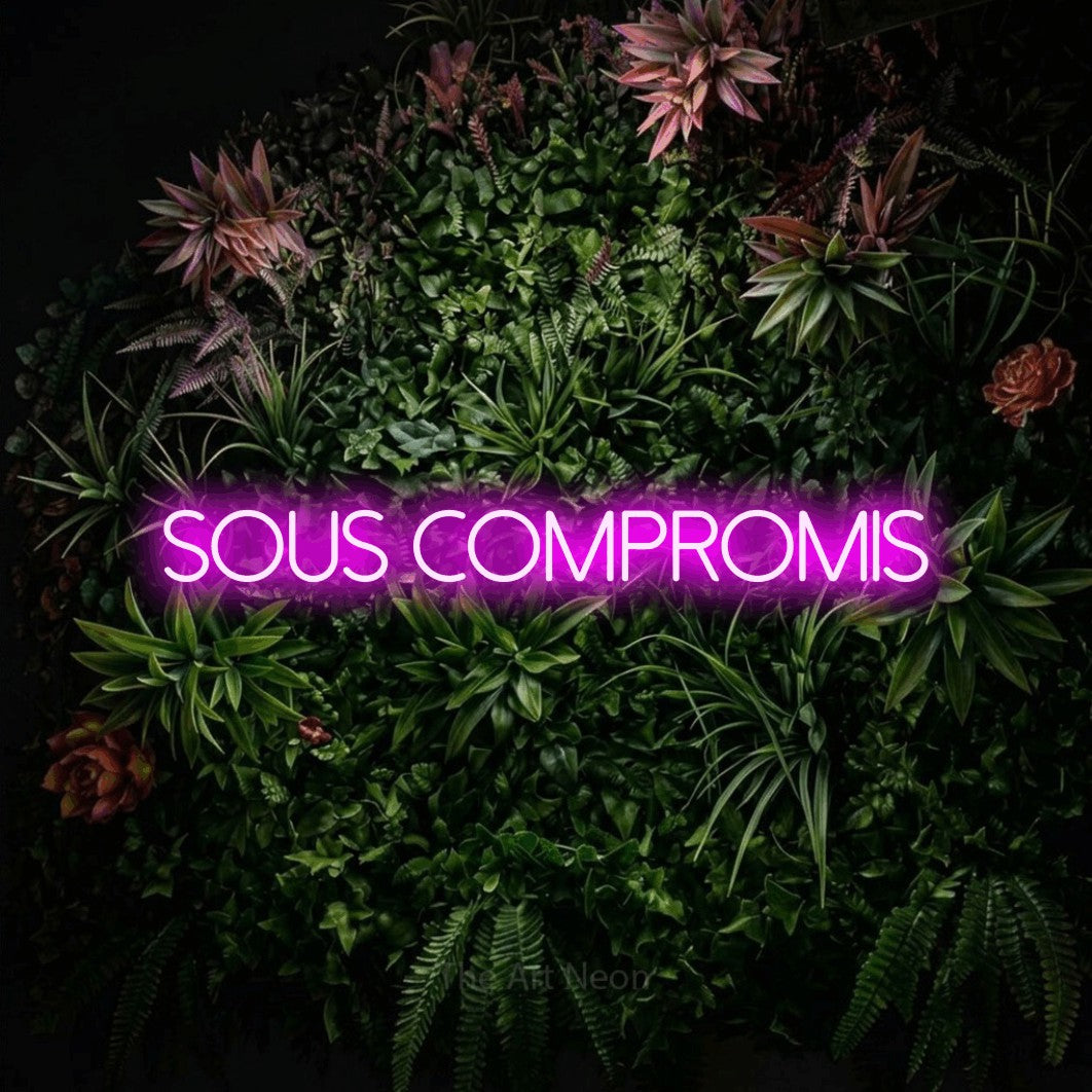 LED neon sign reading “Sous Compromis”, arranged in a single line.