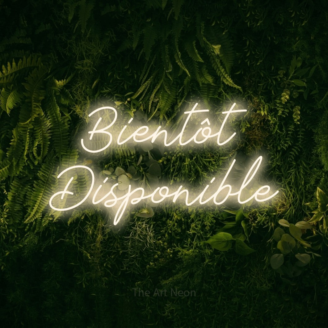 LED neon sign reading “Bientôt Disponible”, arranged in 2 lines.