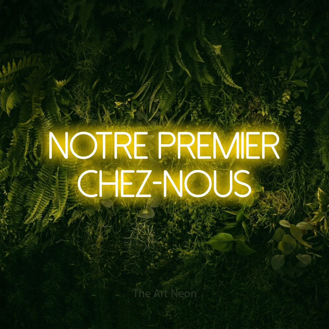 LED neon sign reading “NOTRE PREMIER CHEZ-NOUS”, arranged in 2 lines.