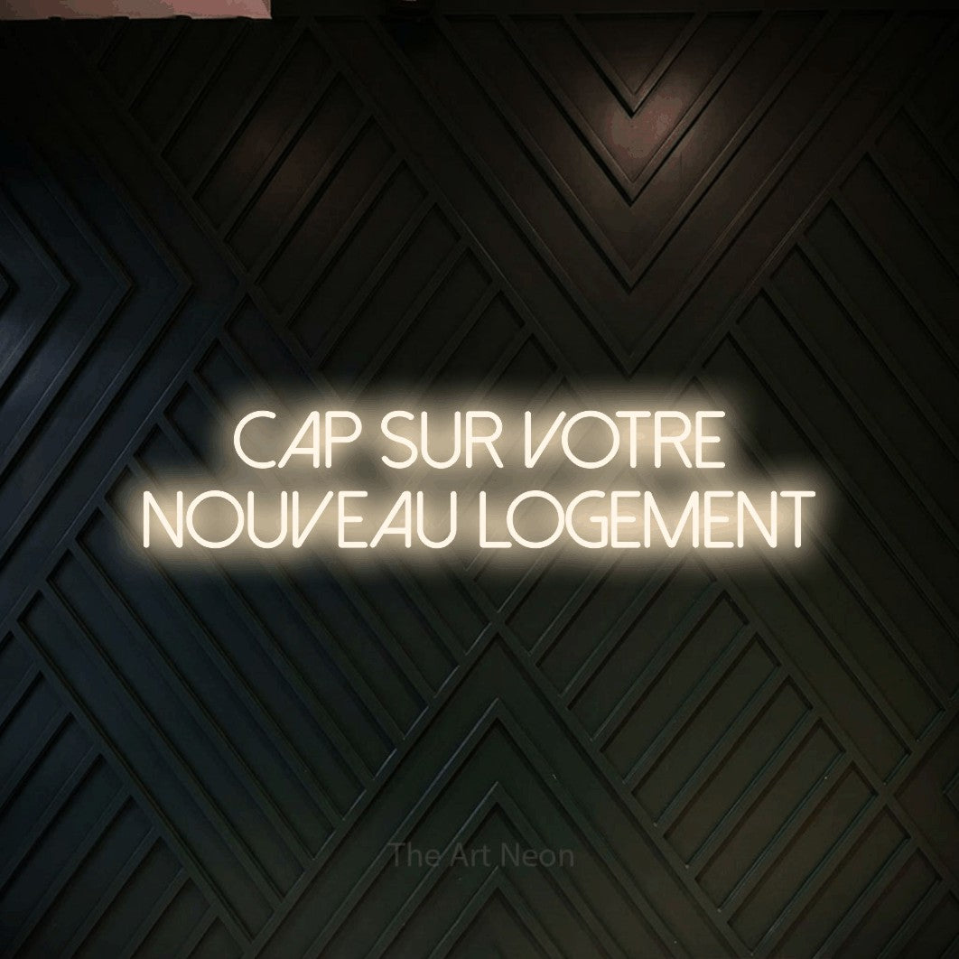 LED neon sign reading “Cap Sur Votre Nouveau Logement”, arranged in 2 lines.