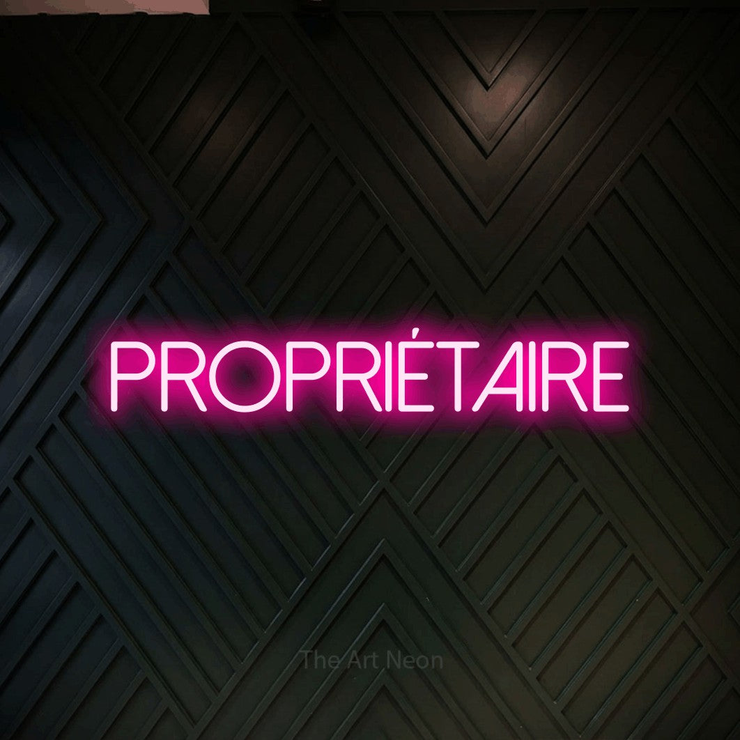 LED neon sign reading “PROPRIÉTAIRE”, arranged in a single line.