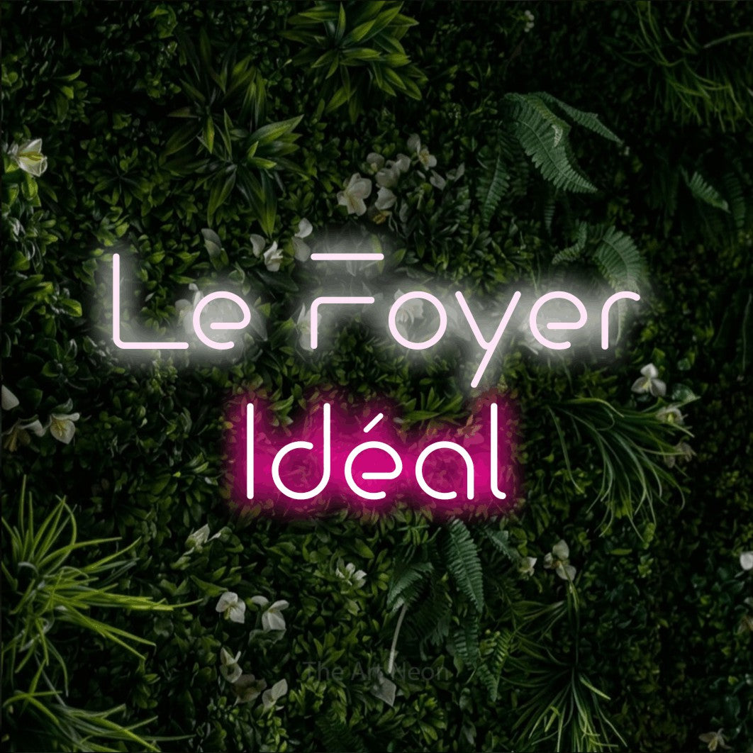 LED neon sign reading “Le Foyer Idéal”, arranged in 2 lines.