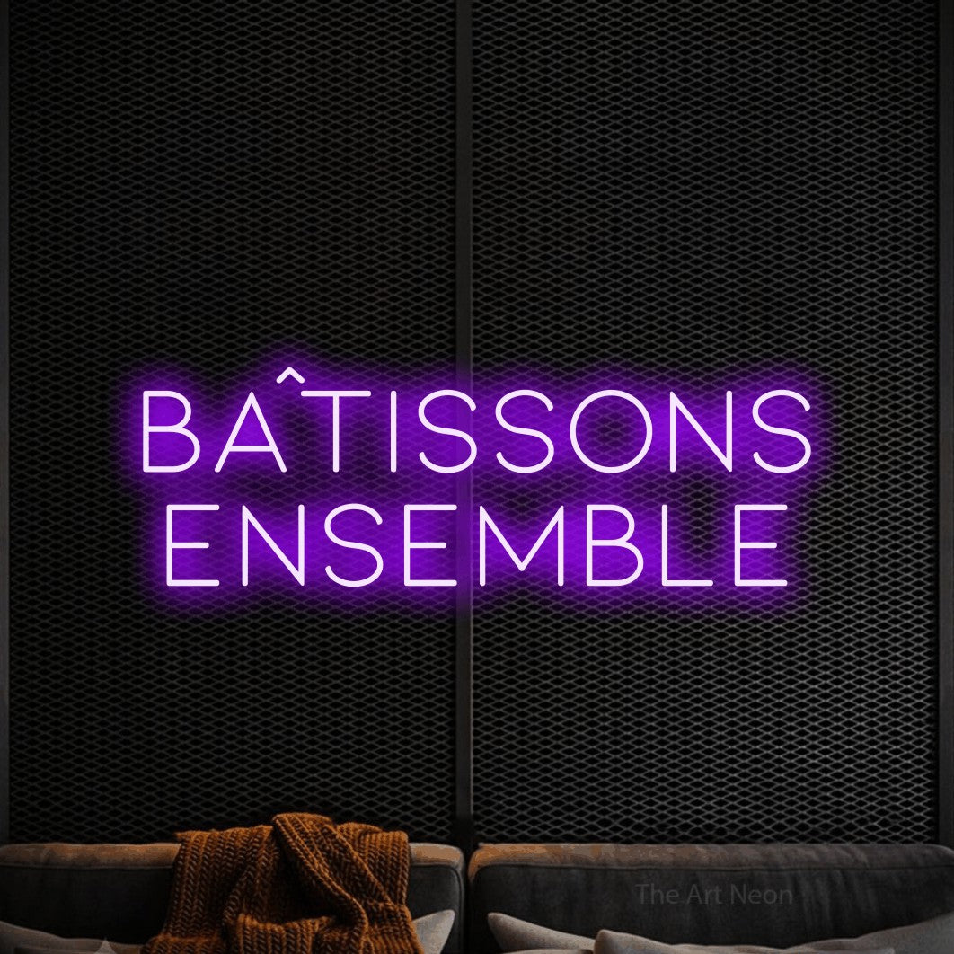 LED neon sign reading “BÂTISSONS ensemble”, arranged in 2 lines.