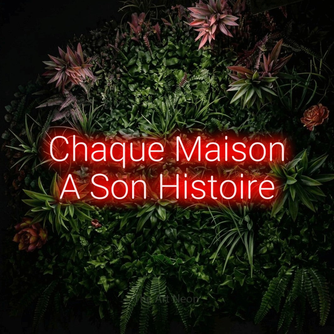 LED neon sign reading “Chaque Maison A Son Histoire”, arranged in 2 lines.