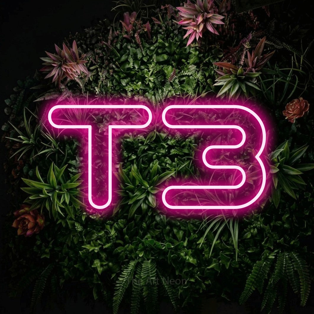 LED neon sign reading “T3”, arranged in a single line.