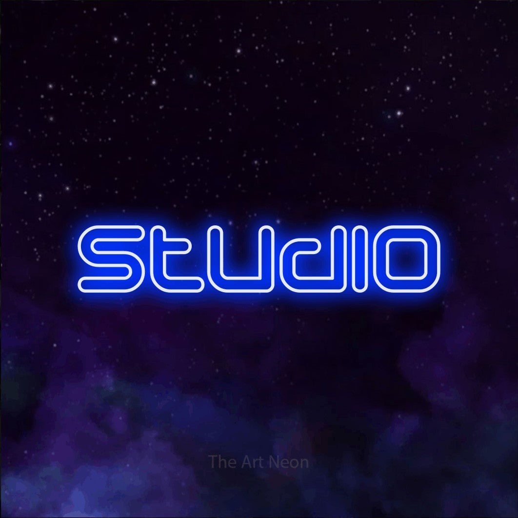 LED neon sign reading “Studio”, arranged in a single line.