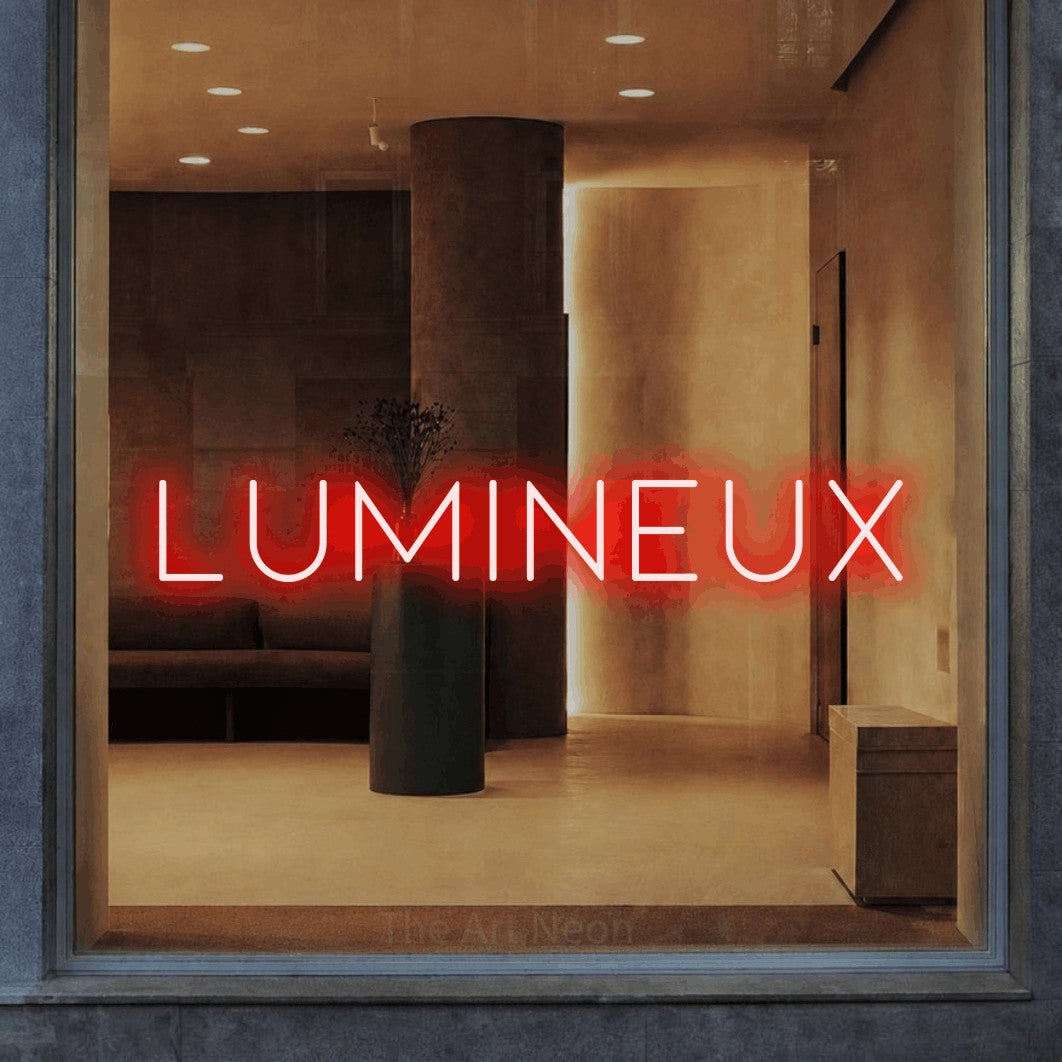 LED neon sign reading “LUMINEUX”, arranged in a single line.