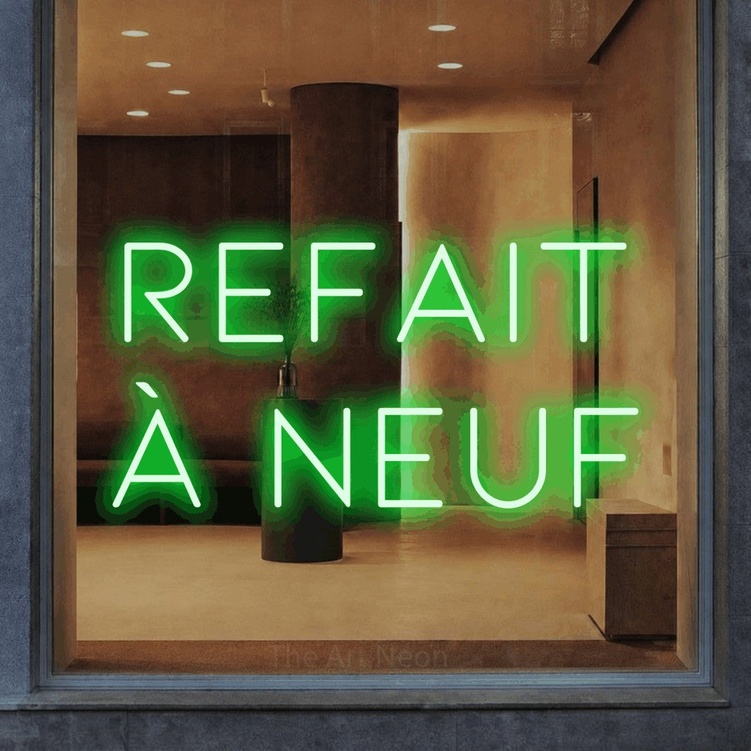 LED neon sign reading “REFAIT à neuf”, arranged in 2 lines.