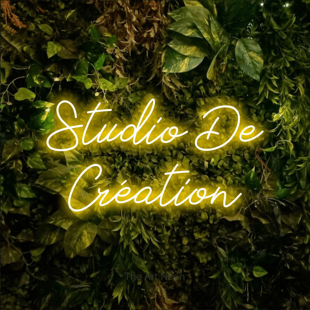 LED neon sign reading “Studio De Création”, arranged in 2 lines.