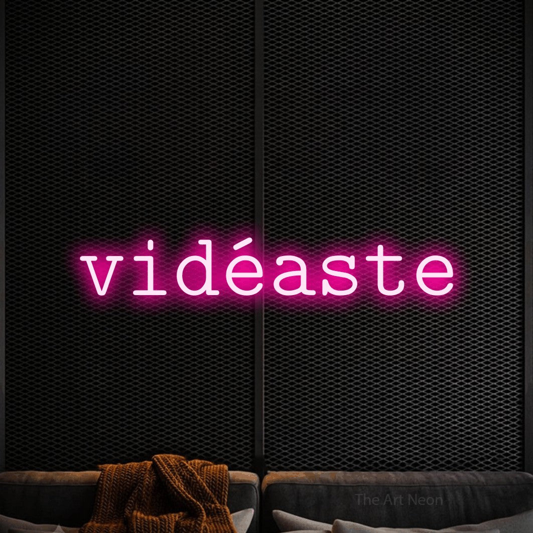 LED neon sign reading “vidéaste”, arranged in a single line.
