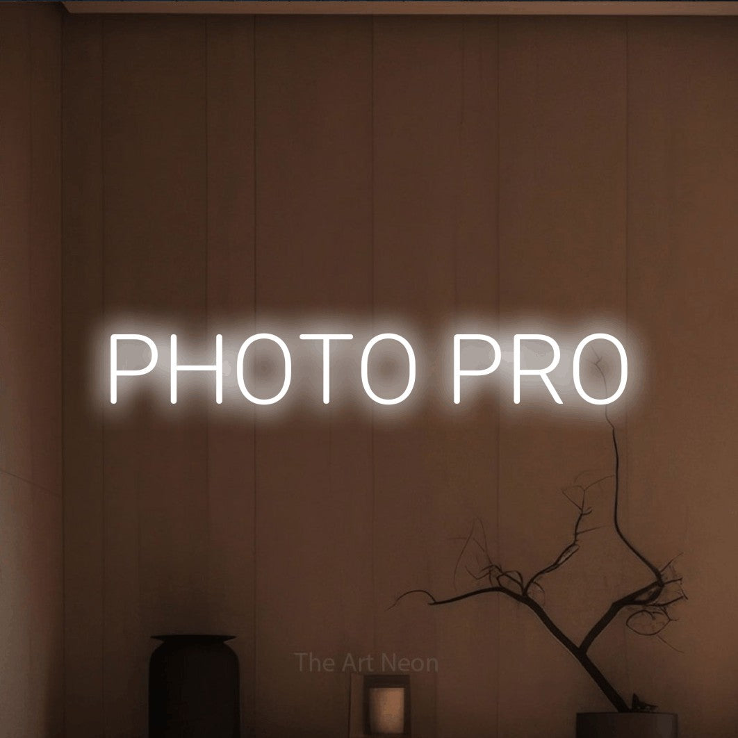 LED neon sign reading “PHOTO PRO”, arranged in a single line.