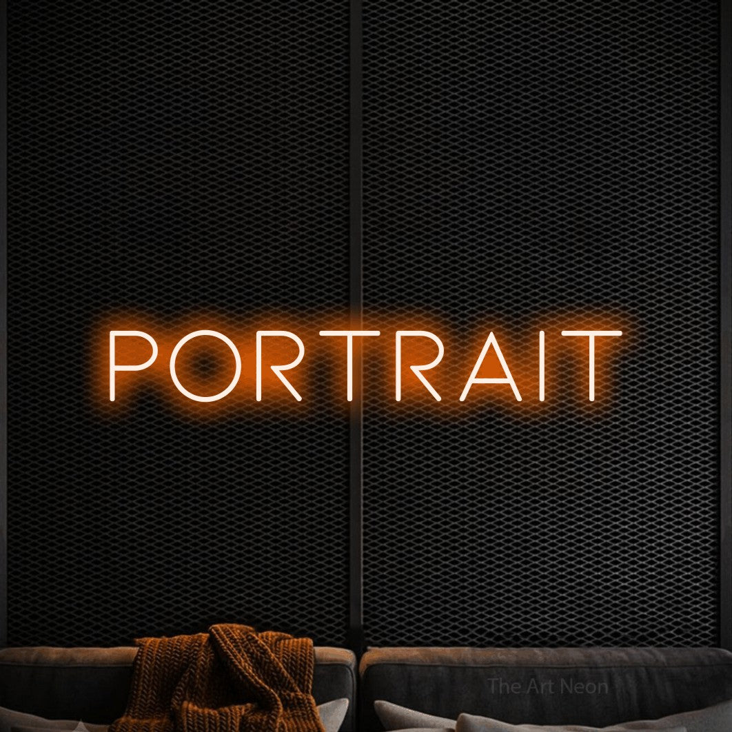 LED neon sign reading “Portrait”, arranged in a single line.