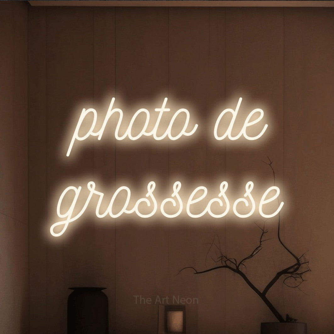 LED neon sign reading “photo de grossesse”, arranged in 2 lines.