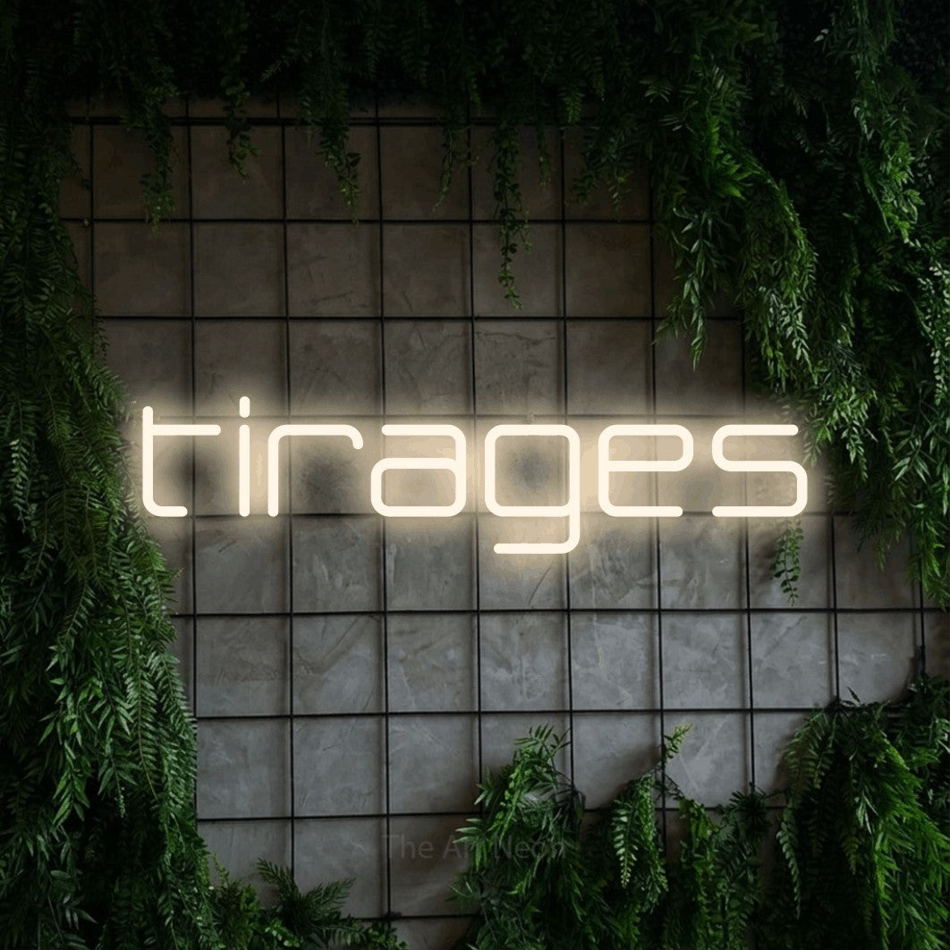 LED neon sign reading “tirages”, arranged in a single line.