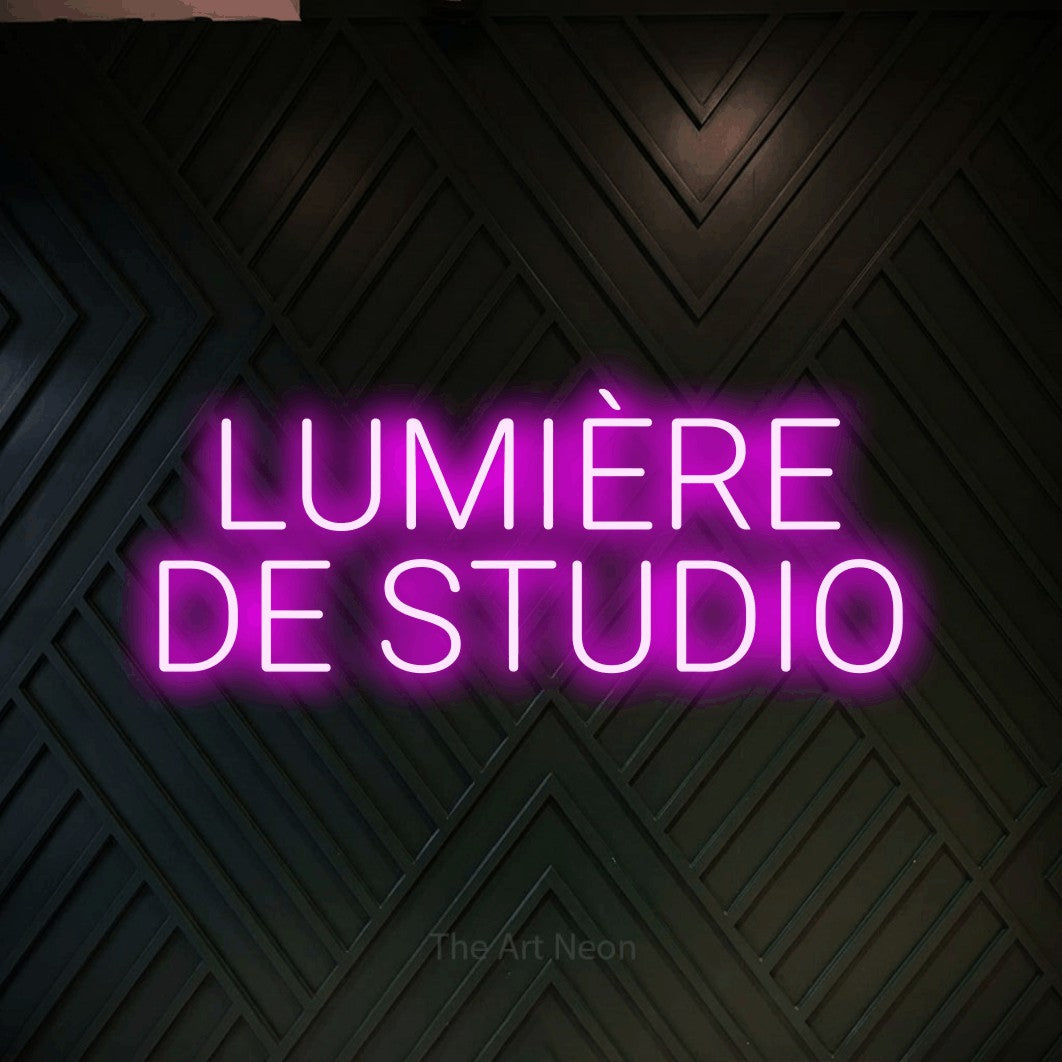 LED neon sign reading “LUMIÈRE DE STUDIO”, arranged in 2 lines.
