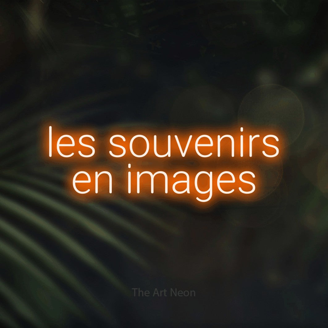 LED neon sign reading “les souvenirs en images”, arranged in 2 lines.