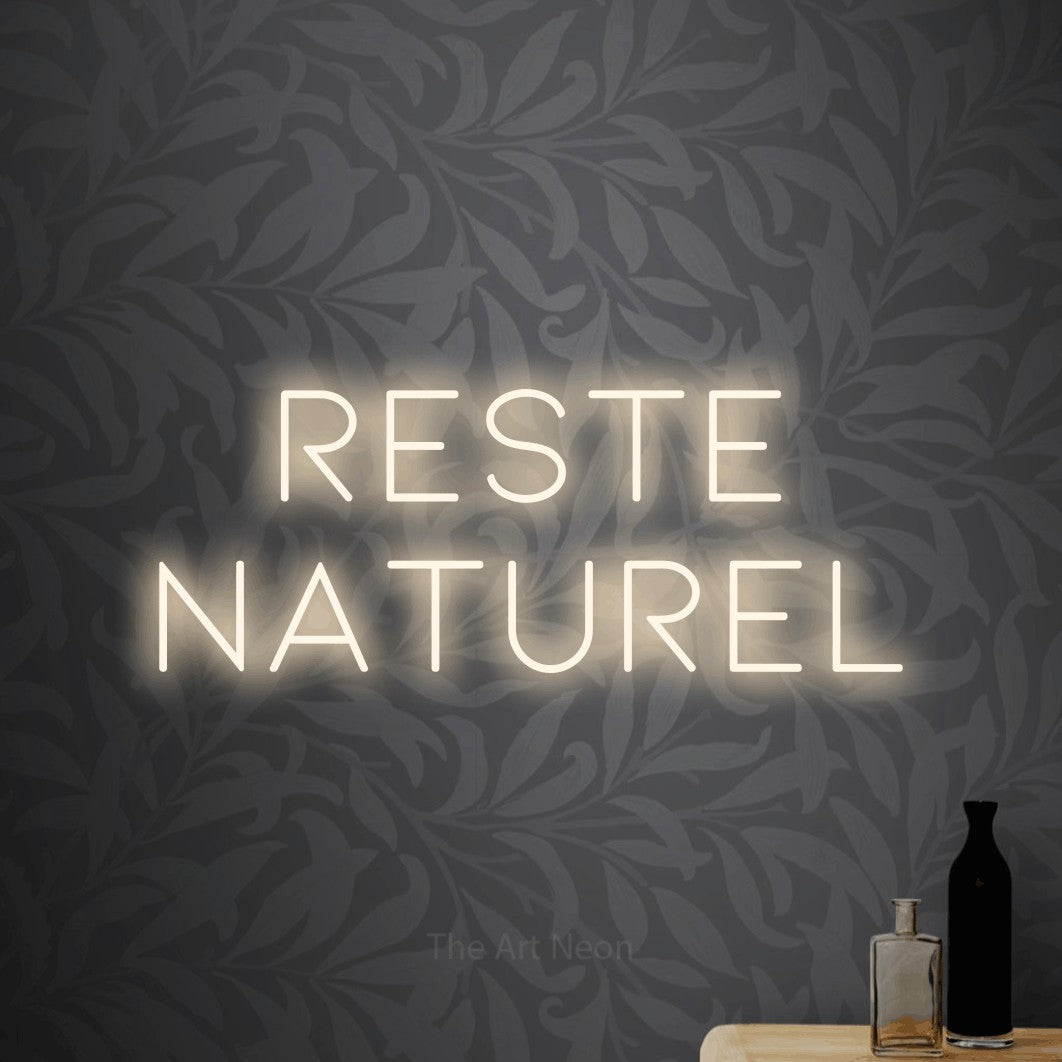 LED neon sign reading “Reste Naturel”, arranged in 2 lines.