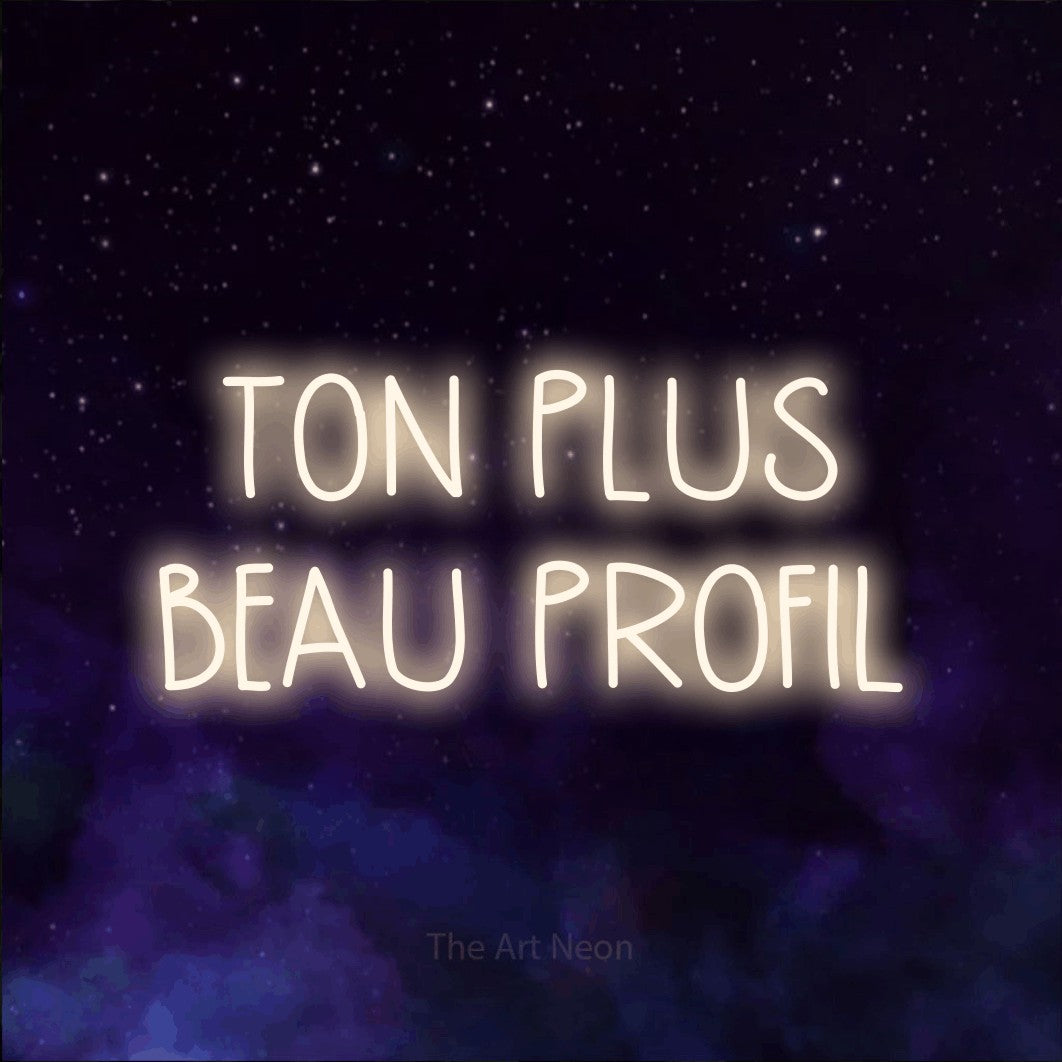 LED neon sign reading “TON PLUS BEAU PROFIL”, arranged in 2 lines.