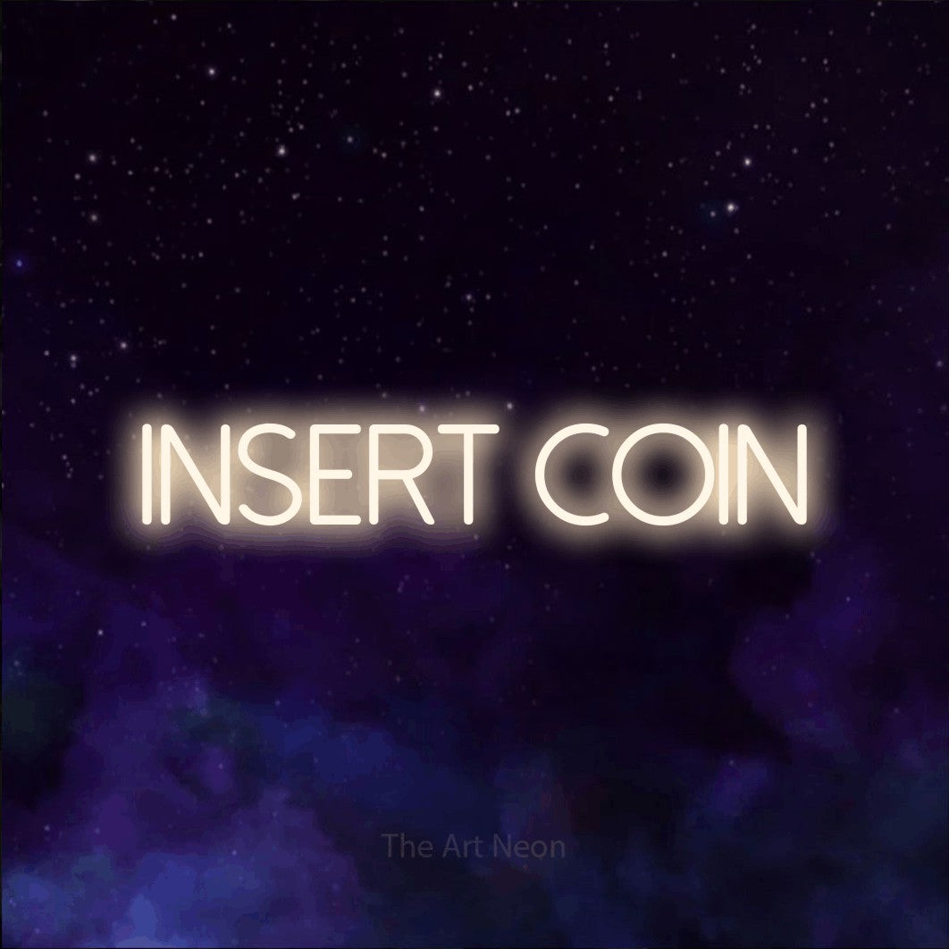 LED neon sign reading “INSERT COIN”, arranged in a single line.