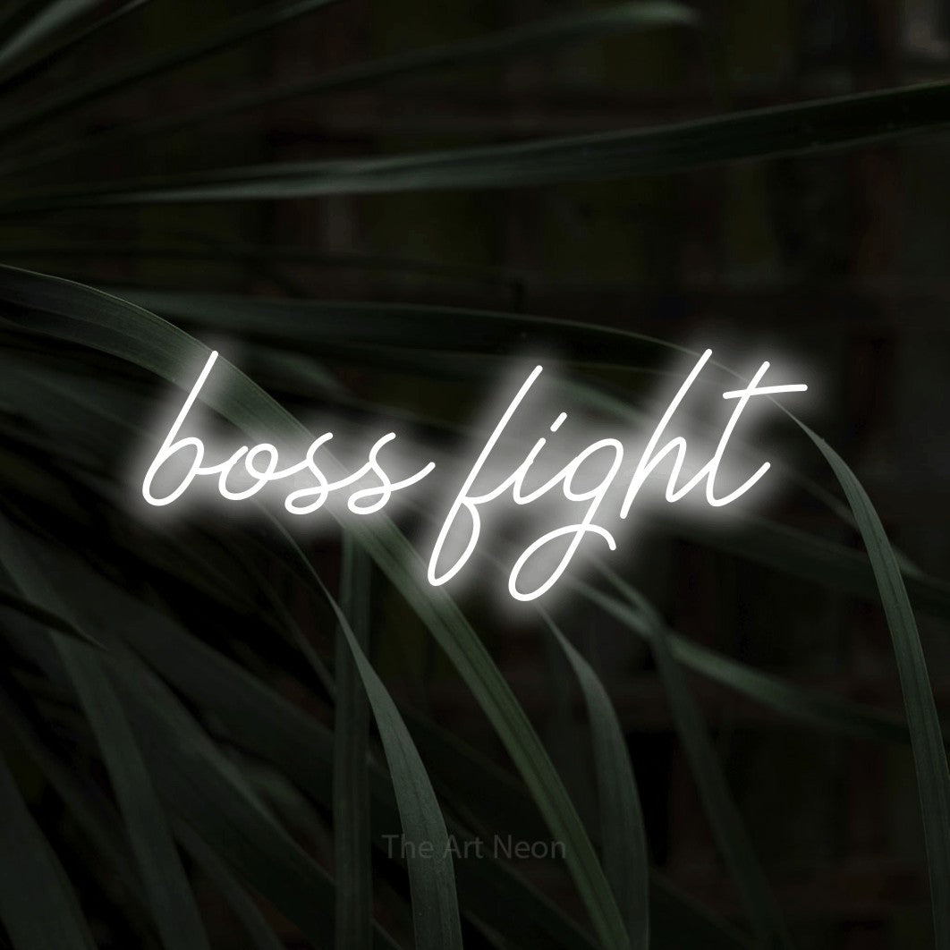 LED neon sign reading “boss fight”, arranged in a single line.