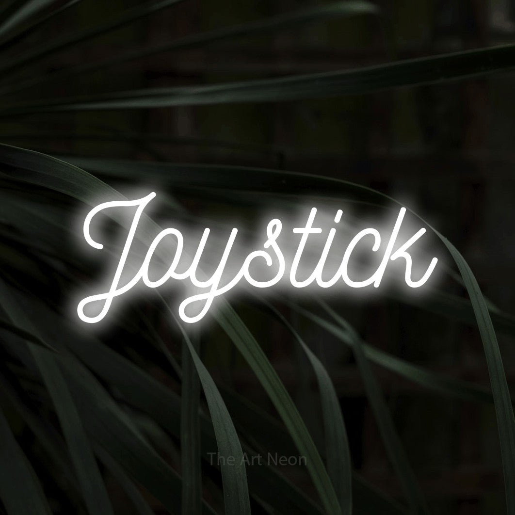 LED neon sign reading “Joystick”, arranged in a single line.