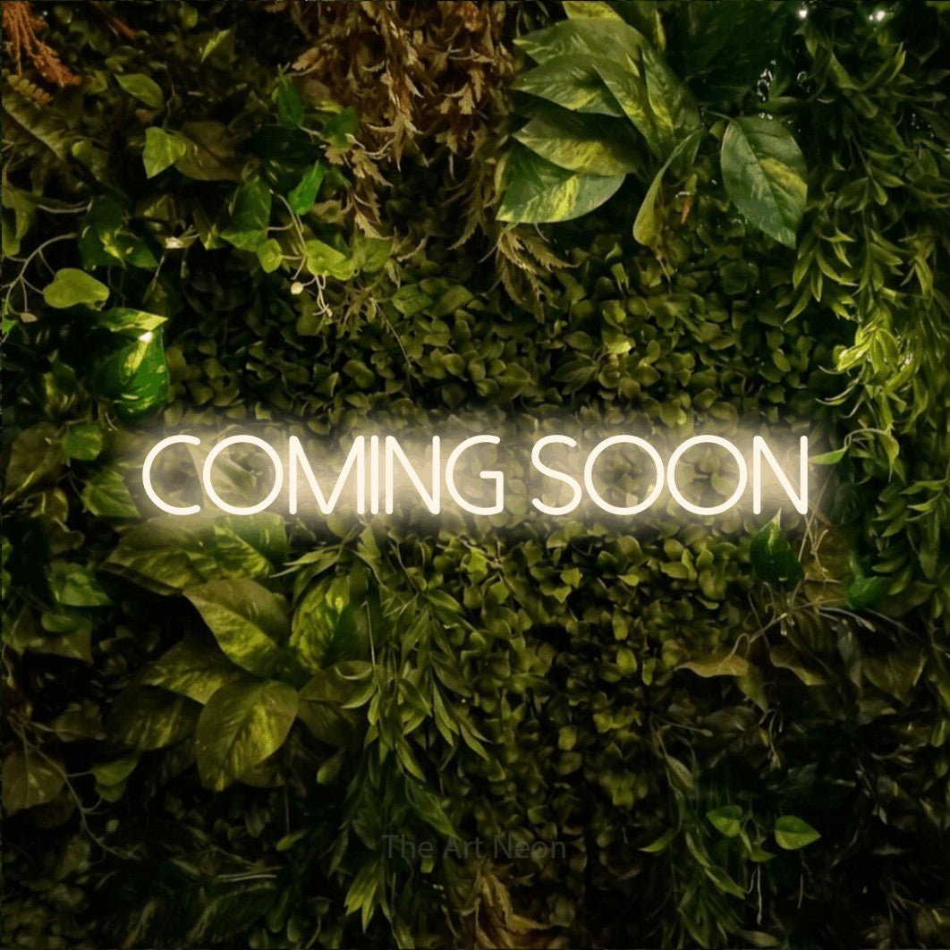 LED neon sign reading “Coming Soon”, arranged in a single line.