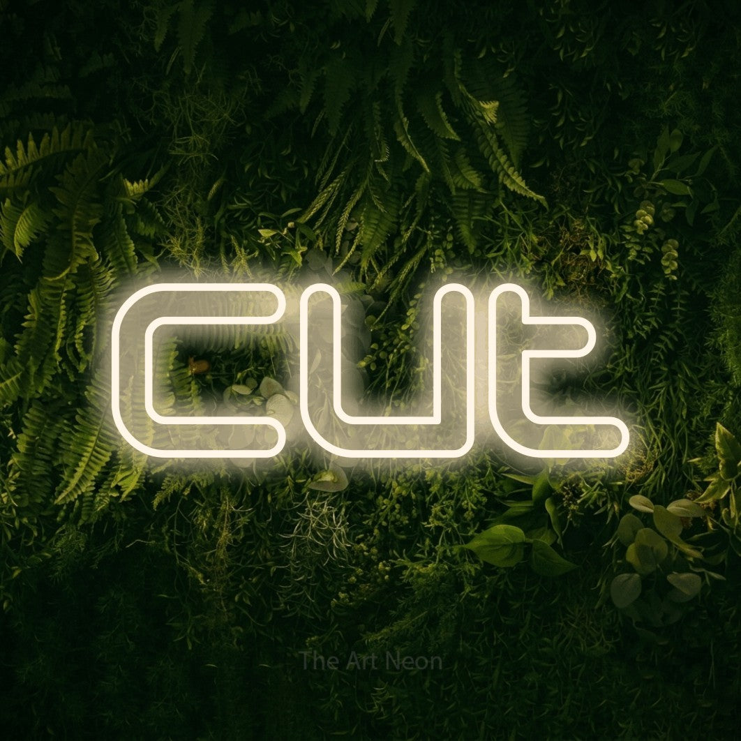 LED neon sign reading “Cut”, arranged in a single line.