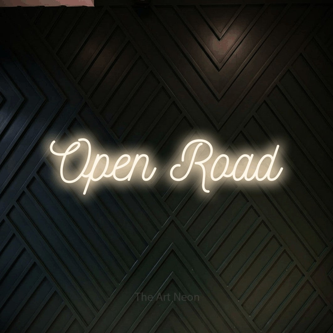 LED neon sign reading “Open Road”, arranged in a single line.
