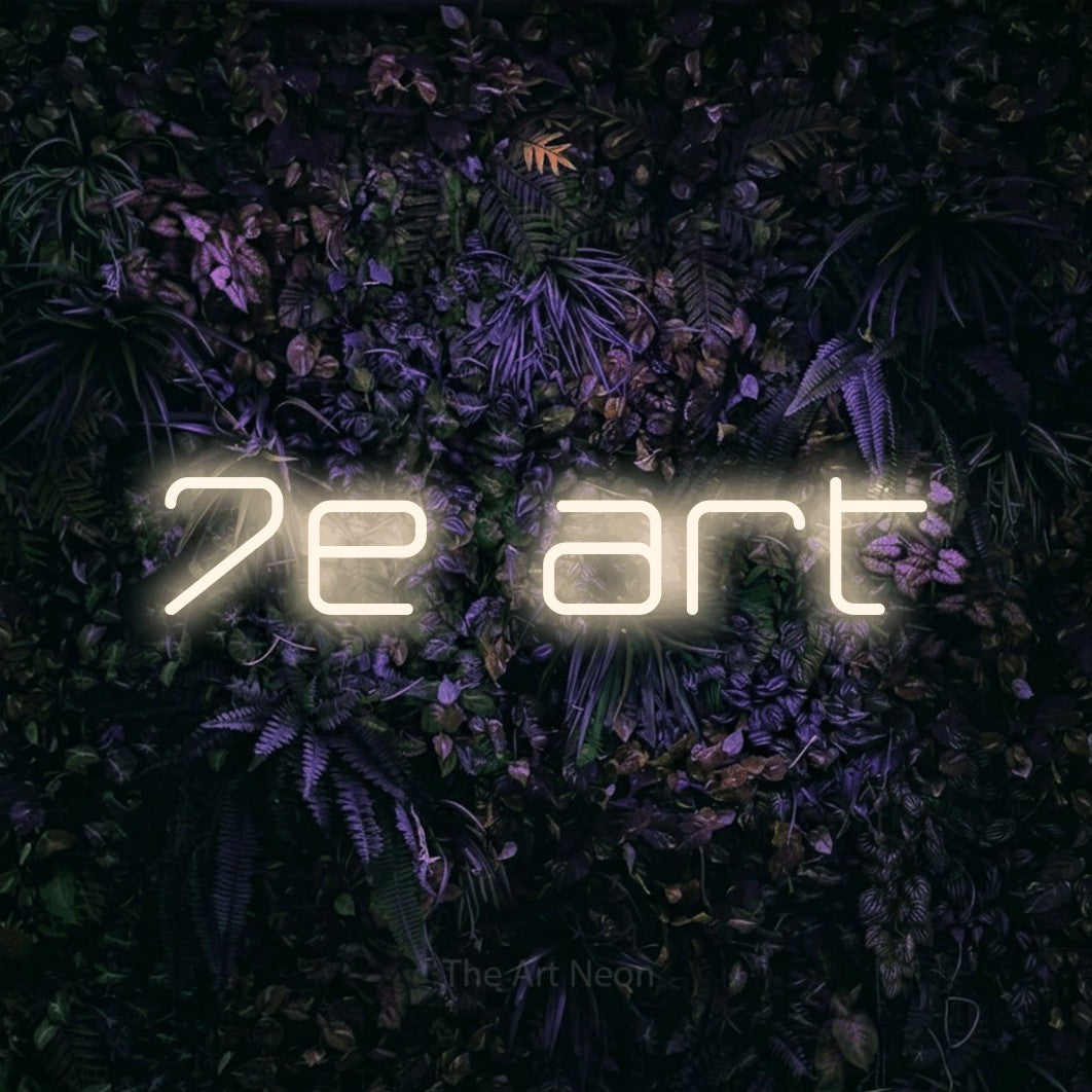 LED neon sign reading “7e art”, arranged in a single line.
