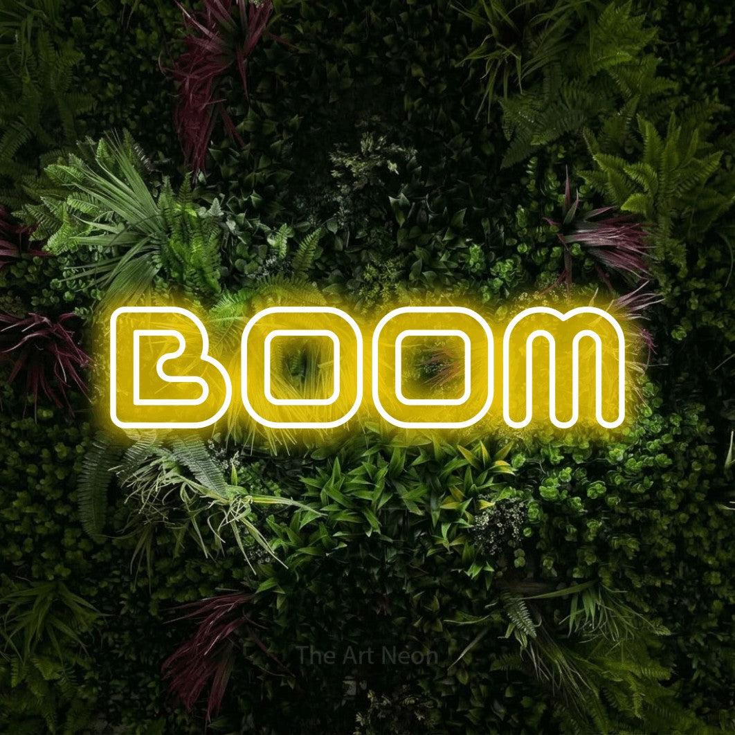 LED neon sign reading “Boom”, arranged in a single line.
