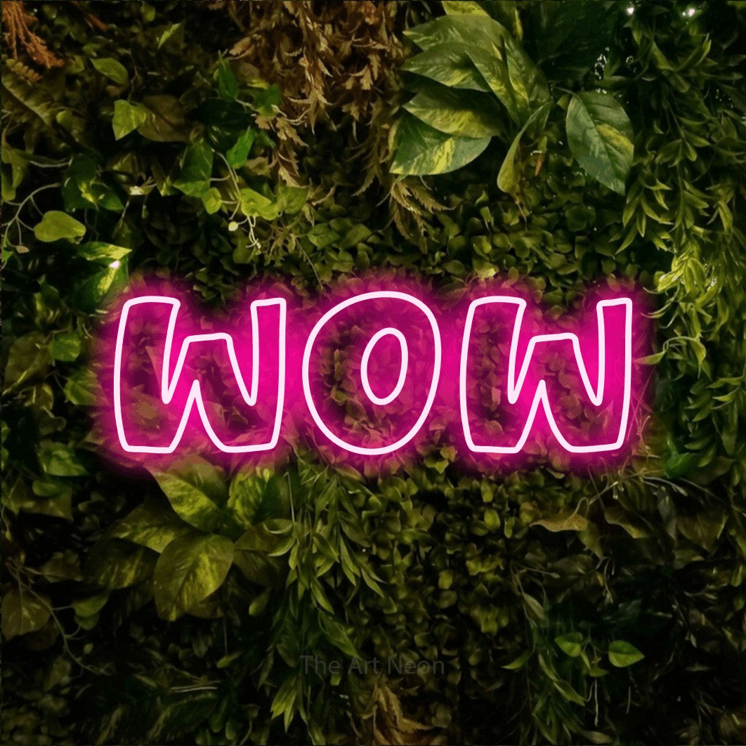 LED neon sign reading “wow”, arranged in a single line.