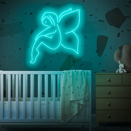 "Fairy Neon Sign" lights up with a magical glow, perfect for children's rooms and spaces that embrace the whimsical world of fairies, adding enchantment to the ambiance.