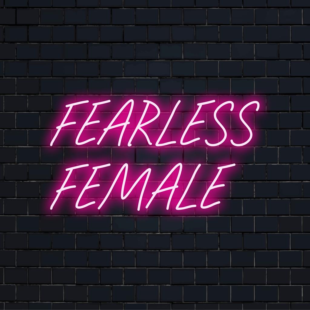 Custom-made LED neon sign of Fearless Female phrase in glowing script for modern wall decor and empowering neon light art.