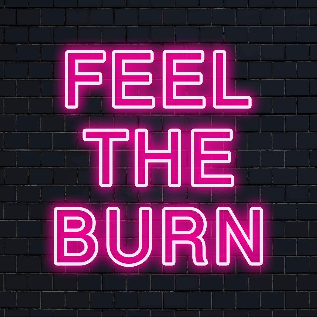 Custom LED neon sign spelling Feel The Burn; vibrant neon wall art, perfect for fitness lovers.