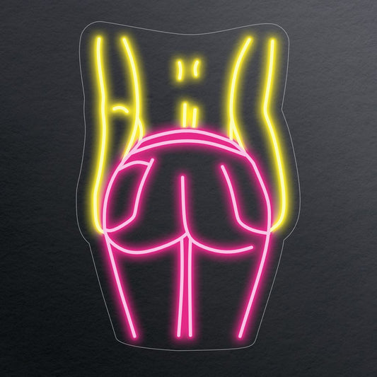 "Female Backside Neon Sign" lights up with artistic expression, celebrating the beauty and form of the female backside. Perfect for spaces appreciating the aesthetic appeal of the human body in art.