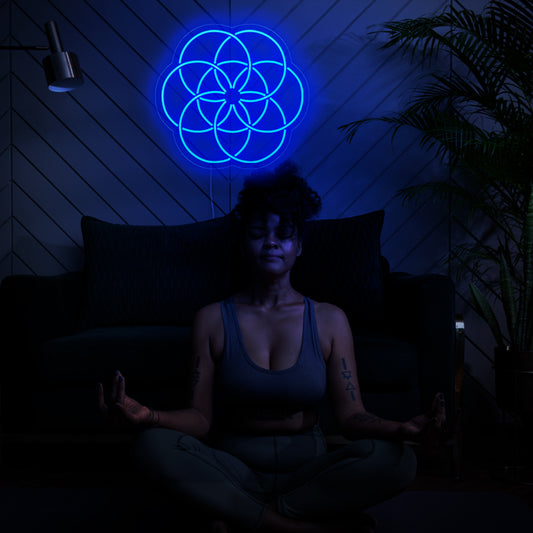 "Flower of Life Neon Sign" lights up with sacred geometry, perfect for spiritual spaces and areas embracing the symbolic beauty of the Flower of Life, adding a touch of spirituality to the ambiance.