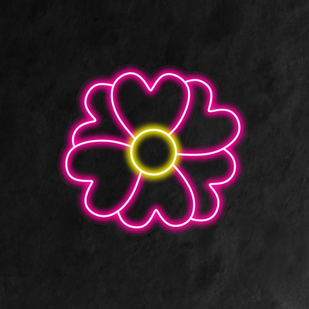 An illuminated neon sign featuring a beautiful flower with heart-shaped leaves, adding a touch of nature-inspired charm and floral elegance to any space