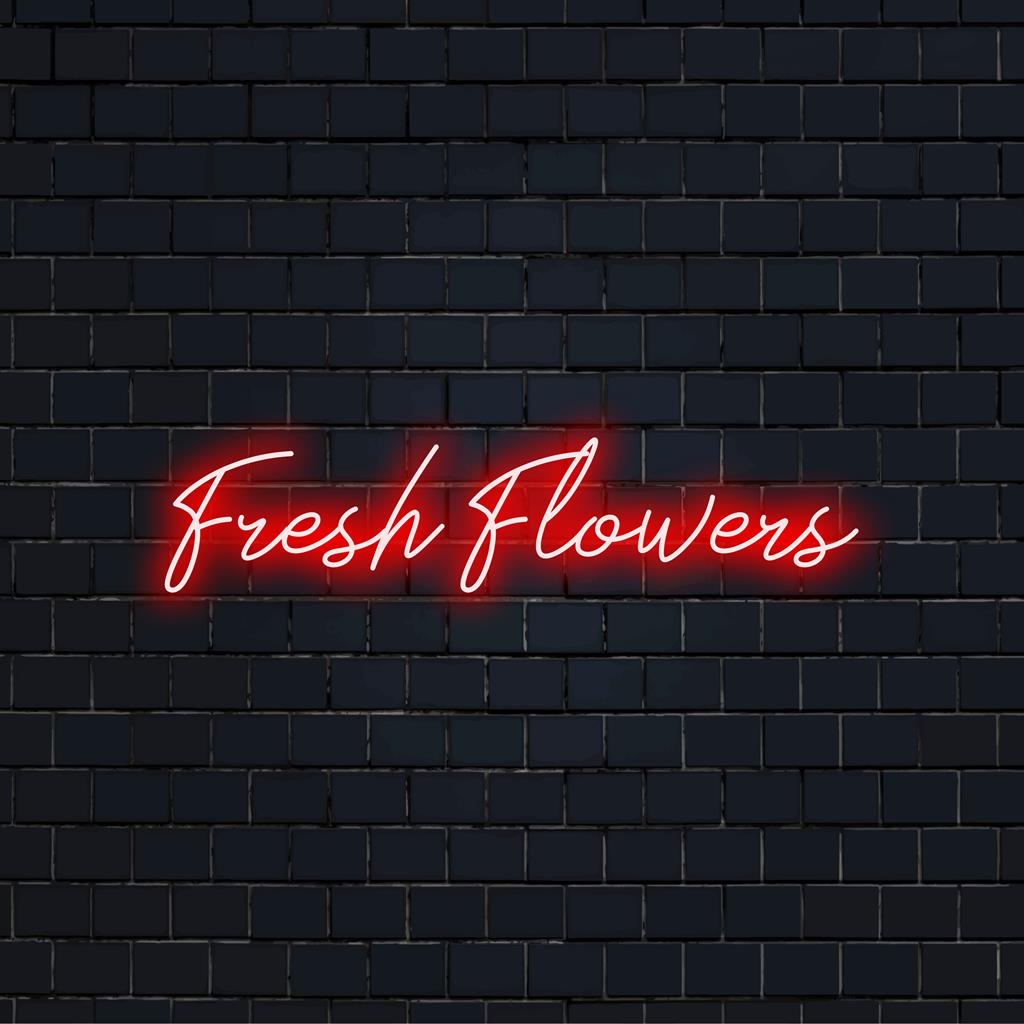 Illuminated Fresh Flowers neon sign showcasing bright custom LED lettering, perfect for vibrant neon interior decor.