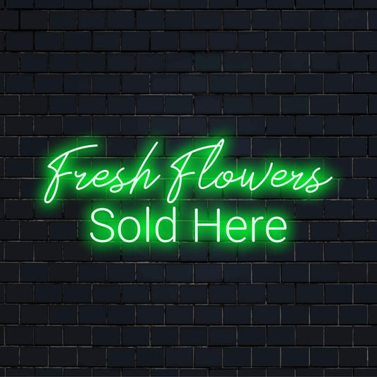 Φωτεινή και ελκυστική, αυτή η προσαρμοσμένη επιγραφή LED νέον γράφει Fresh Flowers Sold Here για μια εντυπωσιακή οθόνη λιανικής.