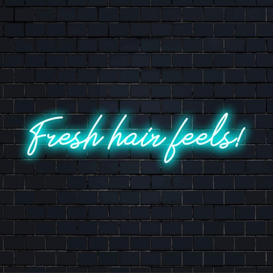 Custom LED neon sign displaying Fresh Hair Feels! in vibrant lights, perfect for salons or personal grooming spaces.