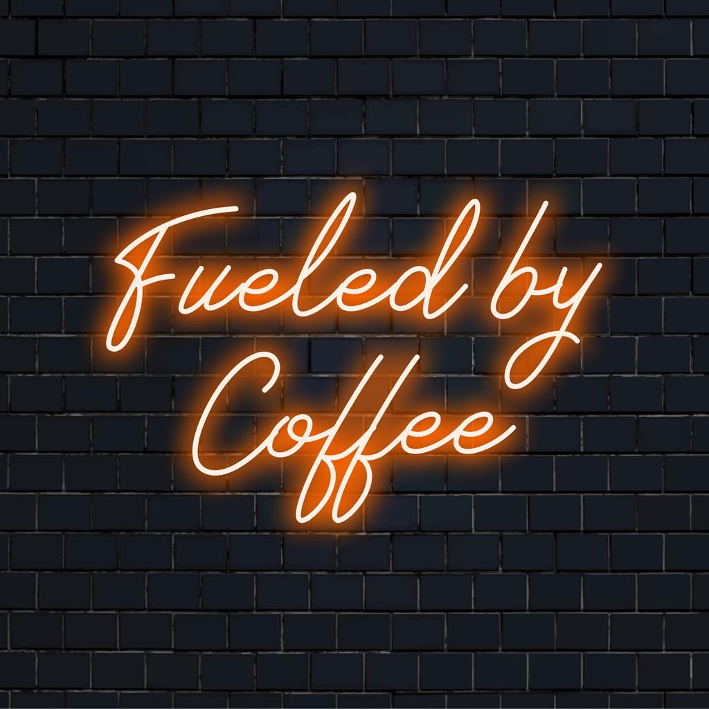 Custom-made LED neon sign displaying Fueled by Coffee. Perfect neon wall art for coffee enthusiasts.