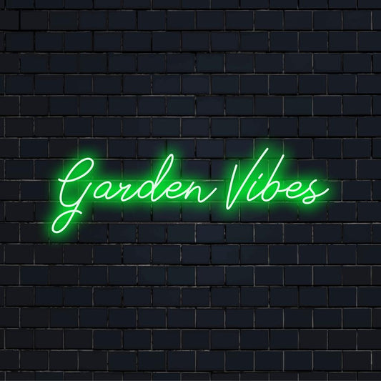 Vibrant Garden Vibes LED neon sign glowing in rich green, perfect for adding a nature-inspired touch to any space.