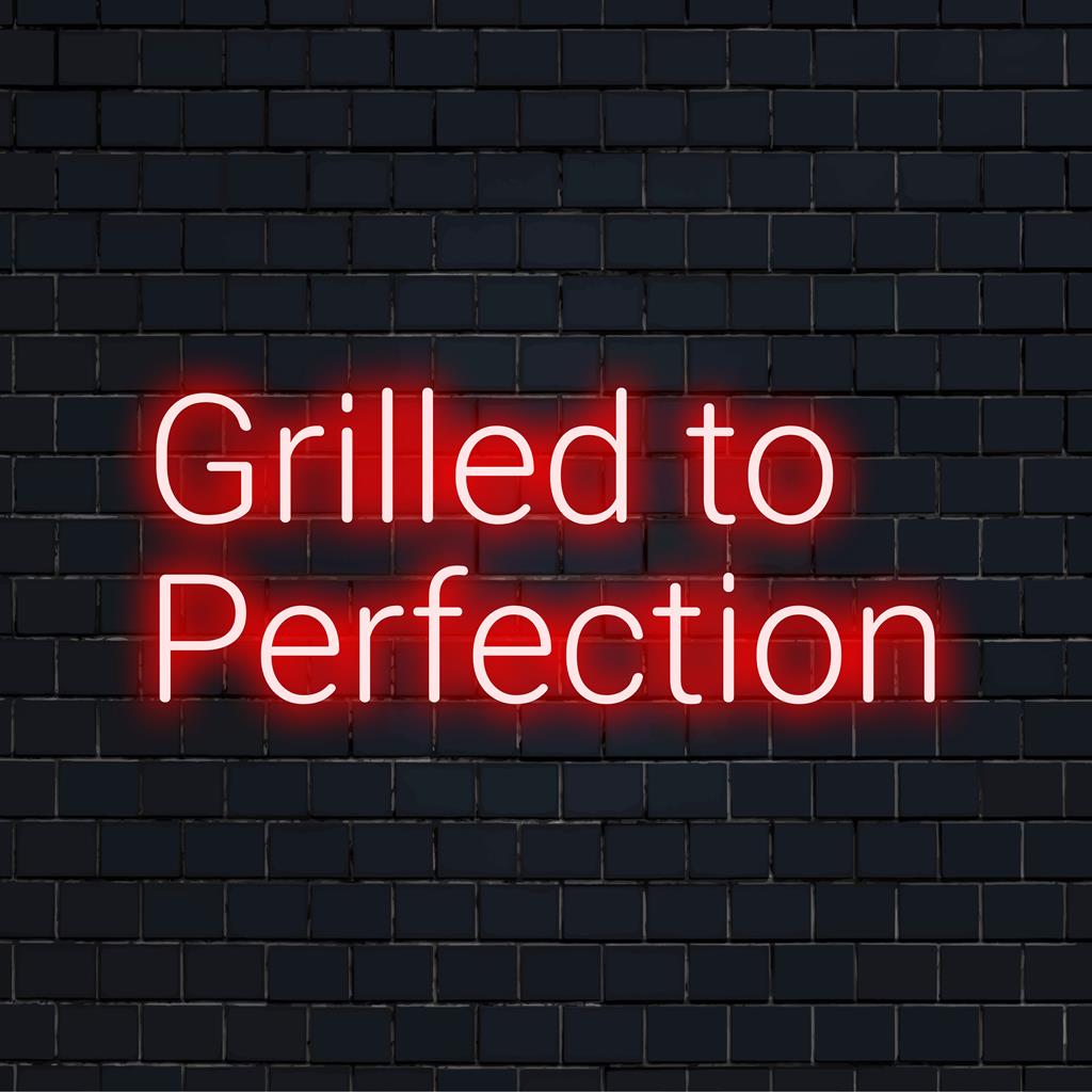 Custom LED Neon Sign reading Grilled to Perfection in chic script, ideal for BBQ lovers' decor, adding a glowing flair.